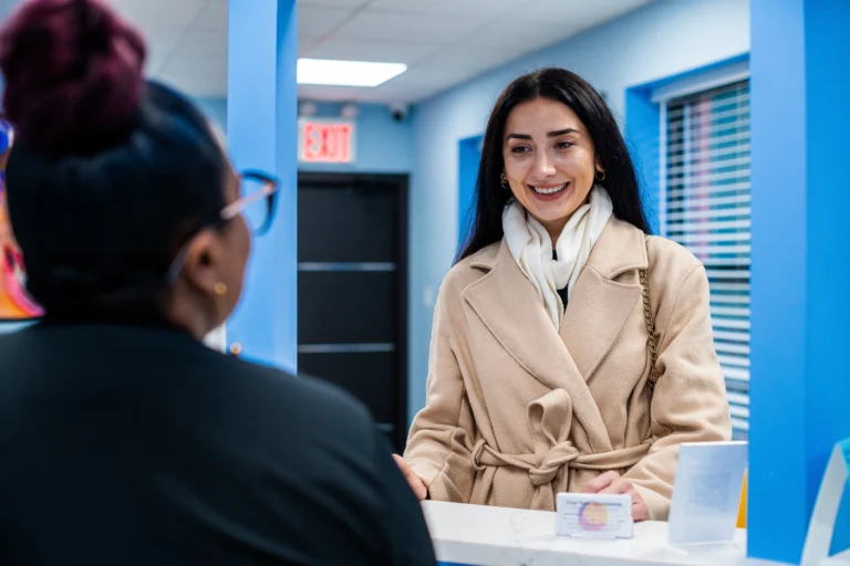 young female going to Aura Dental in NY for tooth extraction